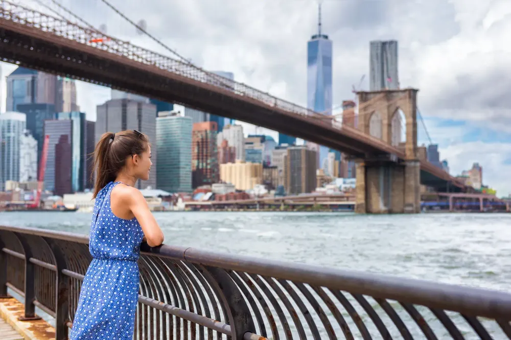 Woman looking over the New York City skyline